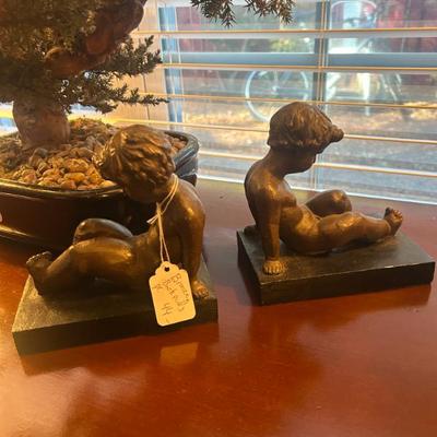 Sale Photo Thumbnail #589: Bronze children bookends. $44. 