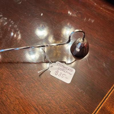 Sale Photo Thumbnail #256: Tiffany & Co. sterling silver candle snuffer. $85. 