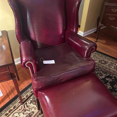 Sale Photo Thumbnail #308: Hancock & Moore leather wingback chair and ottoman. $225. 