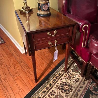 Sale Photo Thumbnail #300: Virginia Galleries drop leaf mahogany side table. Two available. $225 each. 