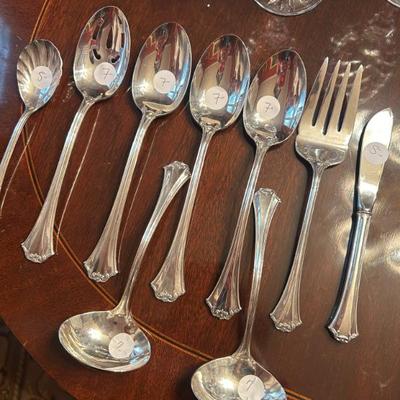 Sale Photo Thumbnail #262: Reed & Barton stainless serving pieces. "French Chippendale" pattern. 