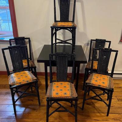 Black Table With 6 Wicker Chair And Cushions