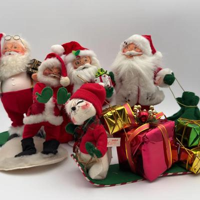 4 Annalee Santa’s And 1 Cat Carrying Presents