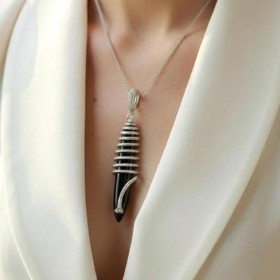 Sale Photo Thumbnail #85: CUSTOM CONTEMPORARY 14K DIAMOND AND ONYX PENDANT