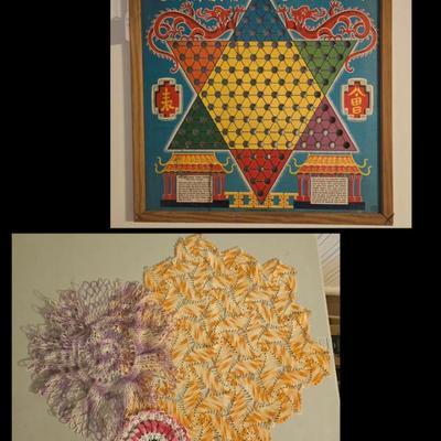 Old Chinese Chevkers board.
Several vintage doilies