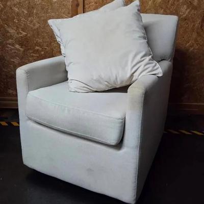 Cream Fabric Swivel Chair and (2) Pillows 