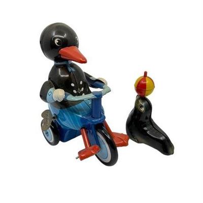 Lot 400-034  
Vintage Tin Toys, Penguin On A Bicycle, Seal Balancing Ball