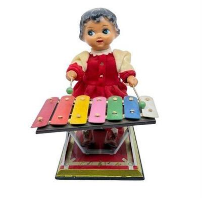 Lot 400-014   
Vintage Xylophone Wind-Up Tin Toy, Little Performer Girl