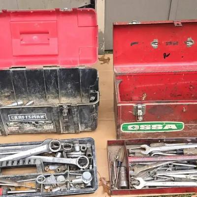 Two Tool Boxes With Various Tools Inside 