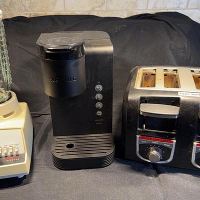 Keurig Coffee Maker, Osterizer Blender, Black And Decker Toaster