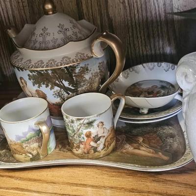 Lots Of Vintage Collectibles on Bottom 3 Shelves. 