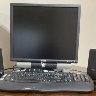Dell Monitor With Logitech Keyboard And Speakers 