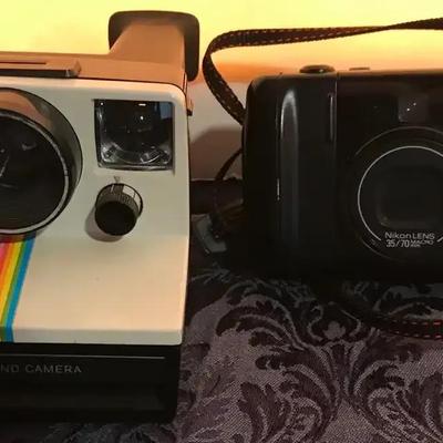 Vintage Polaroid Land Camera And Nikon Tele Touch