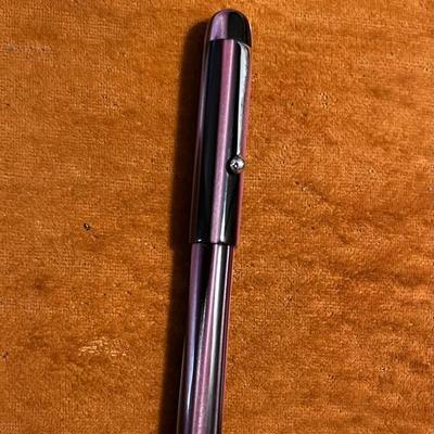 Epic in NYH Purple 8-Swirl Ebonite?