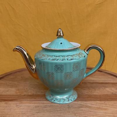 Vintage Hall China turquoise teapot with gold floral pattern