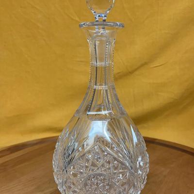 Vintage cut crystal decanter with faceted stopper and pinwheel pattern