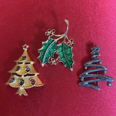Three vintage holiday-themed brooches (one is 925 sterling)