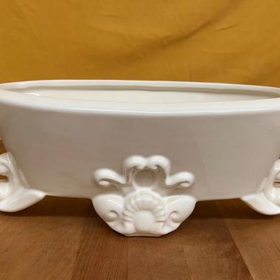 White glazed Hull Pottery oval planter with ornate relief feet