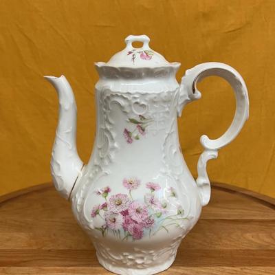 Ornate German Carl Tielsch porcelain coffee pot with floral decoration and relief