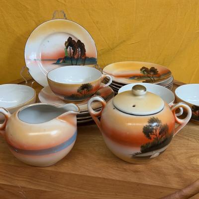 Vintage Japanese hand-painted lusterware porcelain tea set with landscape motif