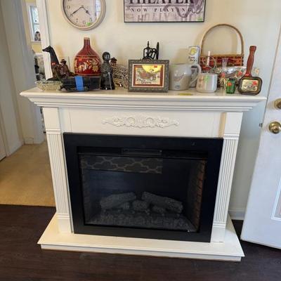 Sale Photo Thumbnail #58: Electric fireplace with wooden surround 