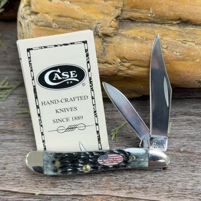 Case XX Peanut – Pitch Black Rogers Bone – American Flag Shield (2003)