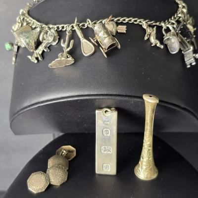 Sterling Silver Ingot Pendant, Charm Bracelet with 19 Charms, Cigarette Holder, Cufflinks