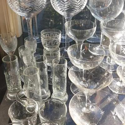 HUGE COLLECTION OF TOMMY BAHAMA GLASS STEMWARE AND MORE