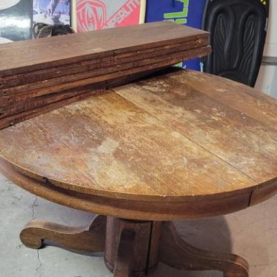 Sale Photo Thumbnail #214: Antique Pedestal Table with 8 leaves