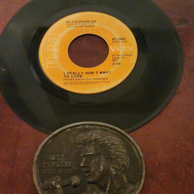 First Edition Elvis Belt Buckle and 45 - 7in Elvis Vinyl Record
