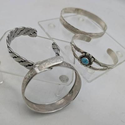 Four Sterling Silver Bracelets 