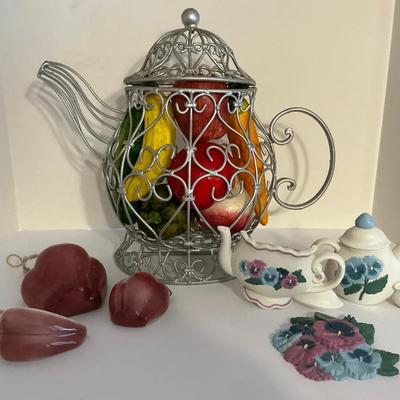 Teapots And Artificial Fruit