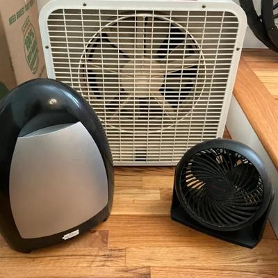 Two Fans And A Touchless, Stationary Vacuum