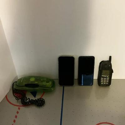 Vintage and Modern Phone Lot: Retro Landline, Old Cell Phone, and Two Modern Smartphones