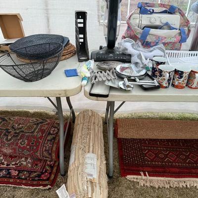 beige rugs, reddish rugs, kitchen items