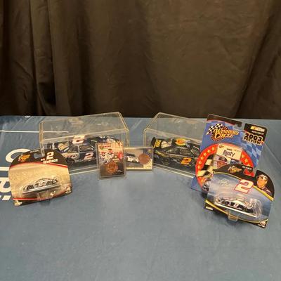 Rusty Wallace NASCAR Collectibles (2 1:24 Replica Cars, 3 1:64 Replica Cars, 2 Collectible Cards)