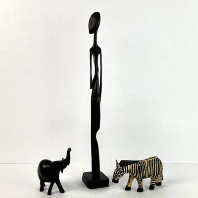 Sale Photo Thumbnail #25: Lot #25 Lot of 3 Vintage African Hand-Carved Wood Sculptures – Angolan Tall Figure w/Export Seal, Ebony Elephant & Painted Zebra