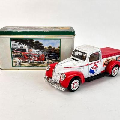 Sale Photo Thumbnail #115: Lot #115 Retro Pepsi-Cola Diecast 1940 Ford Truck Model & Coca-Cola Collectible Tin – Americana Display Set

