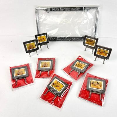 Sale Photo Thumbnail #104: Lot #104 Disney Coca-Cola Mickey 75th Anniversary Mini Easel Frames – 1989 Christmas Card Art & Disney License Plate Holder