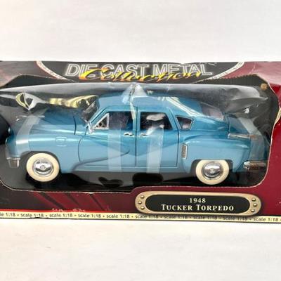 Sale Photo Thumbnail #107: Lot #107 Yat Ming Deluxe Edition 1948 Tucker Torpedo – 1:18 Diecast Metal – Vintage Car Model
