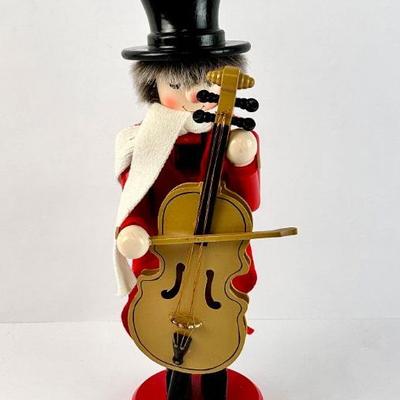 Sale Photo Thumbnail #143: Lot #143 Wooden Christmas Nutcracker Musician • Cello Player in Top Hat & Scarf
