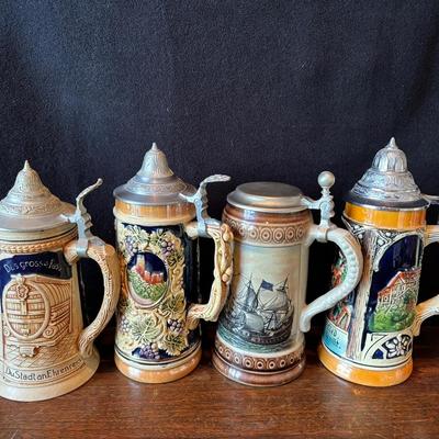 4 Vintage German Beer Steins 