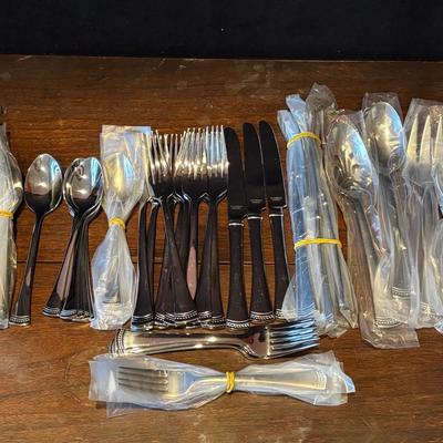 Mostly New Lenox Silver Tone Flatware Set 