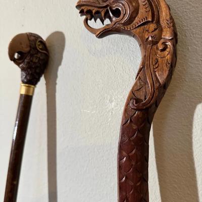Two Wooden Walking Sticks * 37” Dragon * 36” Parrot *