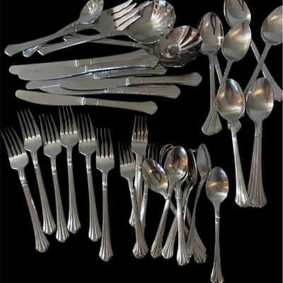 Retroneu Flatware * 10 Soup Spoons * 8 Tea Spoons * 4 Salad Forks * 7 Diner Forks * 6 Knives *