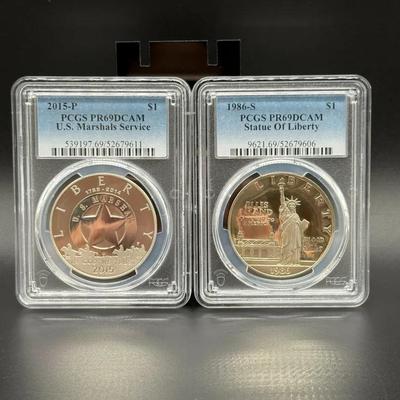 045) PCGS Silver Dollar Pair – 2015 U.S. Marshals & 1986 Statue of Liberty