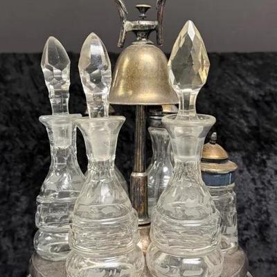 antique silver-plated cruet set, also known as a condiment set or castor set