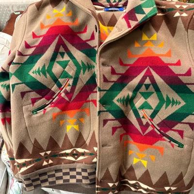 Vintage Pendleton wool blanket jacket featuring a distinctive geometric pattern in brown, green, red