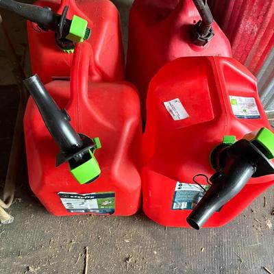 Four 5 Gallon Gas Cans-Plastic 
