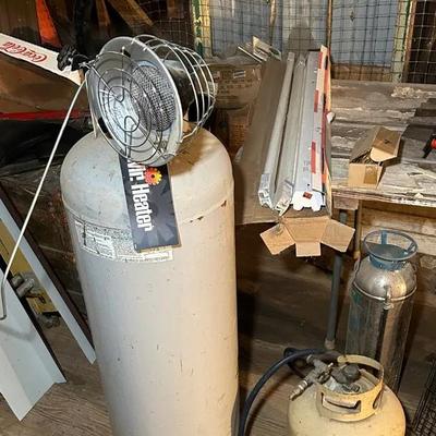 Mr. Heater With A Large And Small Propane Tank 